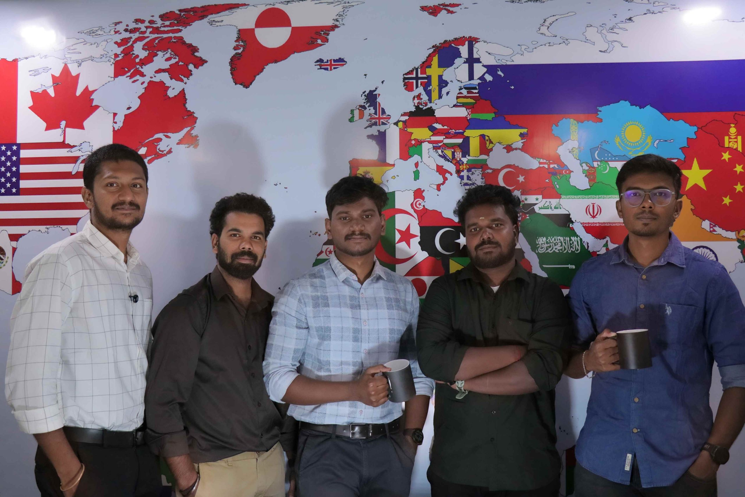 Siteligent team members against a world map backdrop, representing global WordPress website management expertise.